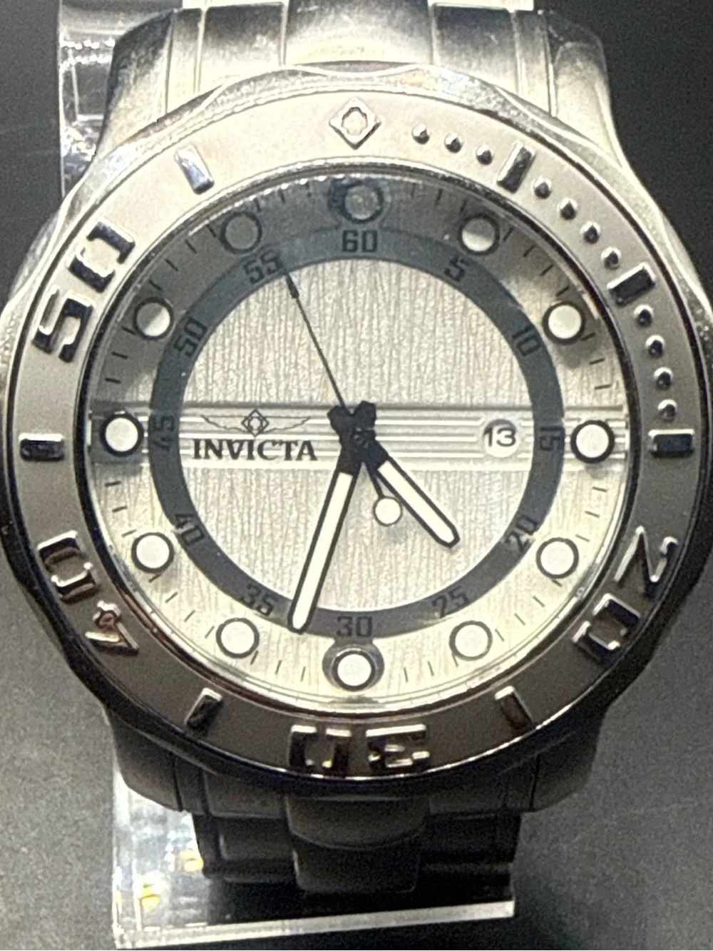 Invicta Pro Diver 0886 (a 52mm silver-tone stainless steel quartz New Battery